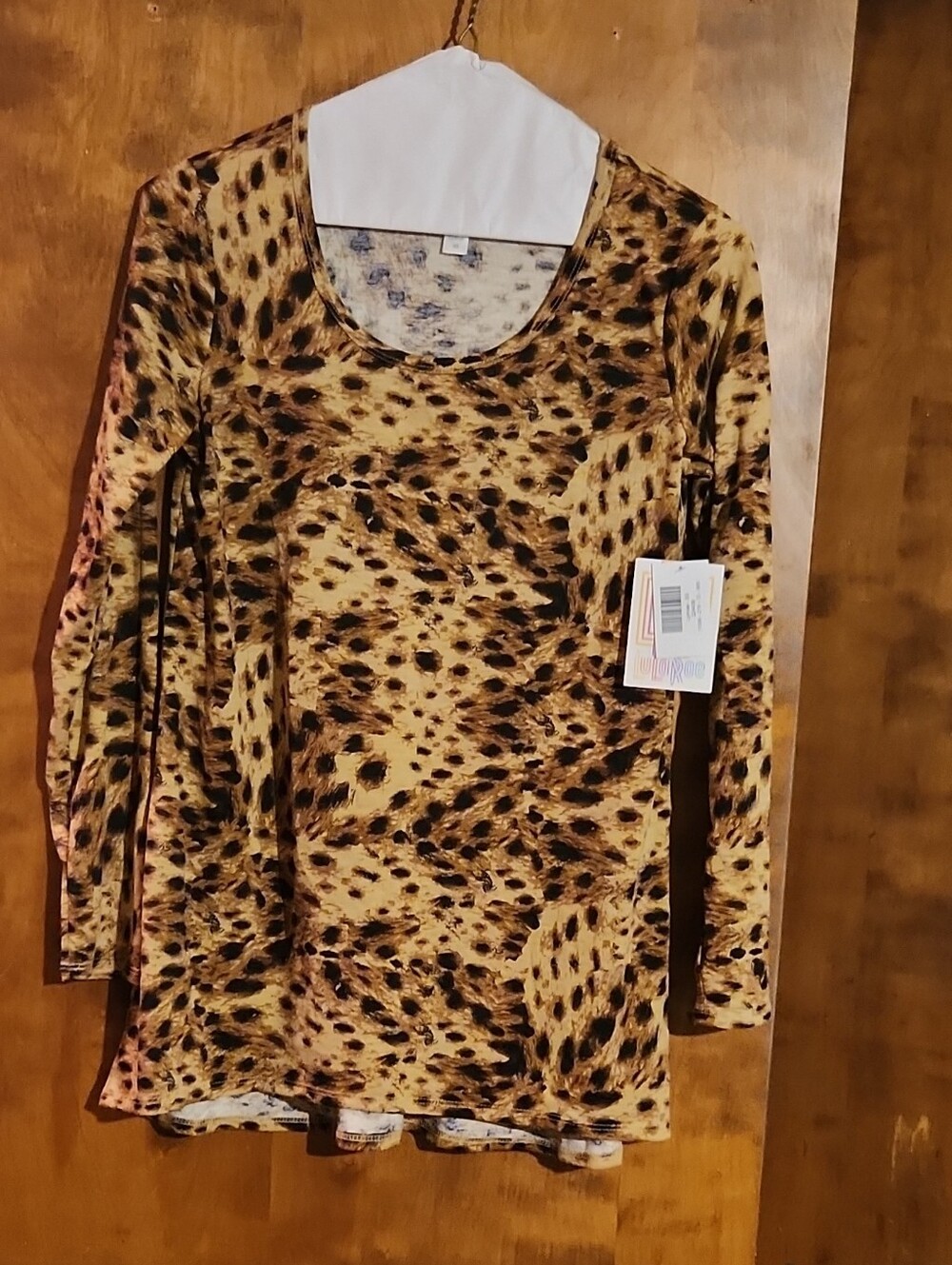 LuLaRoe Long Sleeve Top Cream with Blue Leopard Spots